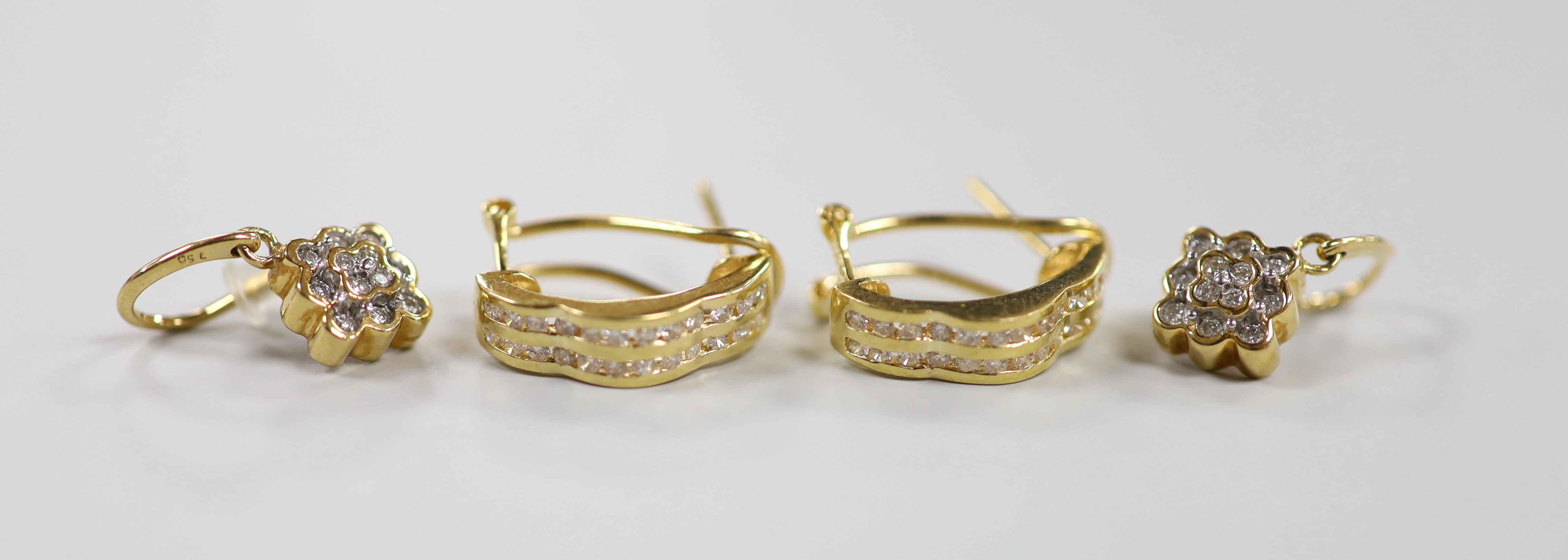 Two modern pairs of 18ct gold and diamond chip cluster earrings, including half hoop, 15mm, gross weight 6.9 grams.